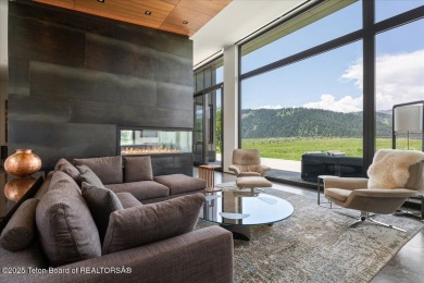 Perched above the Snake River with commanding views of Wolf on Snake River Sporting Club in Wyoming - for sale on GolfHomes.com, golf home, golf lot