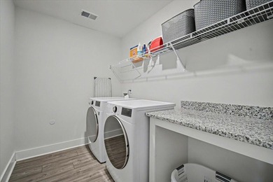 Welcome to 600 Dunswell Drive, a showpiece of modern Lowcountry on Cypress Point Par 3 in South Carolina - for sale on GolfHomes.com, golf home, golf lot