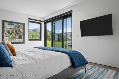 Perched above the Snake River with commanding views of Wolf on Snake River Sporting Club in Wyoming - for sale on GolfHomes.com, golf home, golf lot