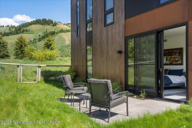 Perched above the Snake River with commanding views of Wolf on Snake River Sporting Club in Wyoming - for sale on GolfHomes.com, golf home, golf lot