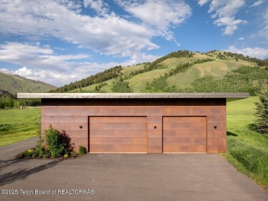 Perched above the Snake River with commanding views of Wolf on Snake River Sporting Club in Wyoming - for sale on GolfHomes.com, golf home, golf lot