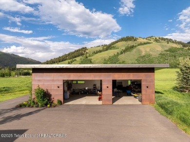 Perched above the Snake River with commanding views of Wolf on Snake River Sporting Club in Wyoming - for sale on GolfHomes.com, golf home, golf lot
