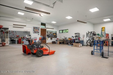 Perched above the Snake River with commanding views of Wolf on Snake River Sporting Club in Wyoming - for sale on GolfHomes.com, golf home, golf lot