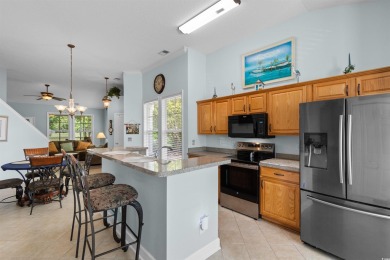 Welcome to this beautifully updated 3-bedroom, 2.5-bath end-unit on Barefoot Resort and Golf Club  in South Carolina - for sale on GolfHomes.com, golf home, golf lot