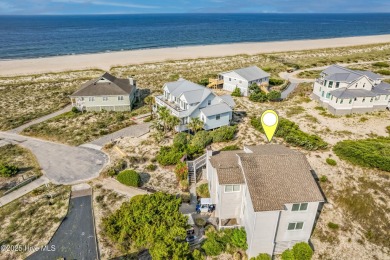 With azure seascapes out almost every window, this four-bedroom on Bald Head Island Golf Club in North Carolina - for sale on GolfHomes.com, golf home, golf lot