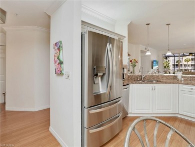 3bd 2 ba end unit condo, with a beautiful lake view. Condo has on Club at Pelican Bay Golf Course in Florida - for sale on GolfHomes.com, golf home, golf lot
