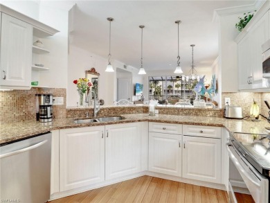 3bd 2 ba end unit condo, with a beautiful lake view. Condo has on Club at Pelican Bay Golf Course in Florida - for sale on GolfHomes.com, golf home, golf lot
