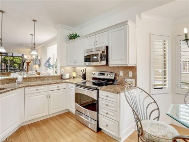 3bd 2 ba end unit condo, with a beautiful lake view. Condo has on Club at Pelican Bay Golf Course in Florida - for sale on GolfHomes.com, golf home, golf lot