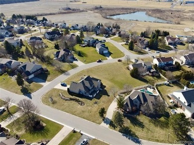 Nestled within Carrington farms and surrounded by beautiful on Carrington Golf Club in Michigan - for sale on GolfHomes.com, golf home, golf lot