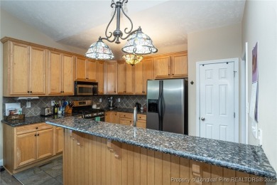 Located in the prestigious gated Gates Four Golf Community and on Gates Four Golf and Country Club in North Carolina - for sale on GolfHomes.com, golf home, golf lot