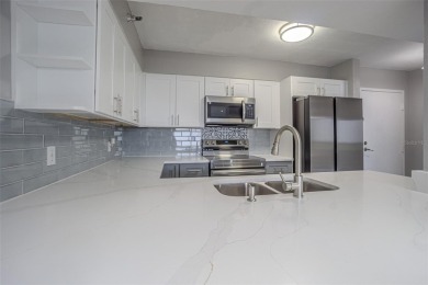 Welcome to this attractive remodeled condo with 2 split bedrooms on Feather Sound Country Club in Florida - for sale on GolfHomes.com, golf home, golf lot