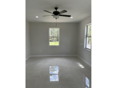 MOVE-IN READY! Brand New house on a  1/2  acre lot in Lake on Indian Lake Estates Golf and Country Club in Florida - for sale on GolfHomes.com, golf home, golf lot