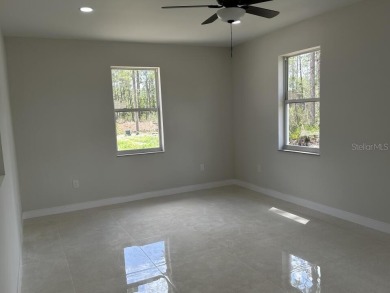 MOVE-IN READY! Brand New house on a  1/2  acre lot in Lake on Indian Lake Estates Golf and Country Club in Florida - for sale on GolfHomes.com, golf home, golf lot