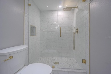 Welcome to this attractive remodeled condo with 2 split bedrooms on Feather Sound Country Club in Florida - for sale on GolfHomes.com, golf home, golf lot