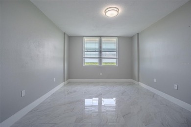 Welcome to this attractive remodeled condo with 2 split bedrooms on Feather Sound Country Club in Florida - for sale on GolfHomes.com, golf home, golf lot