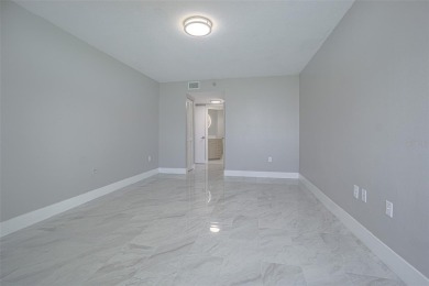 Welcome to this attractive remodeled condo with 2 split bedrooms on Feather Sound Country Club in Florida - for sale on GolfHomes.com, golf home, golf lot