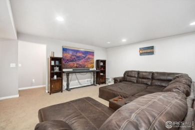 With new carpet on the main floor and fresh front yard on Harmony Golf Club in Colorado - for sale on GolfHomes.com, golf home, golf lot