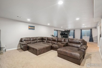 With new carpet on the main floor and fresh front yard on Harmony Golf Club in Colorado - for sale on GolfHomes.com, golf home, golf lot