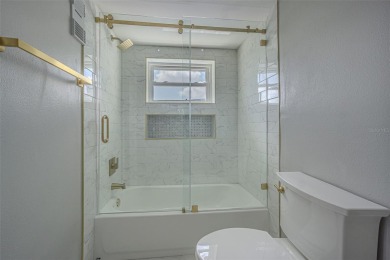 Welcome to this attractive remodeled condo with 2 split bedrooms on Feather Sound Country Club in Florida - for sale on GolfHomes.com, golf home, golf lot