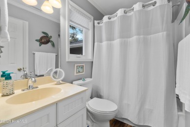 Welcome to 606 Camellia Lane, located in the amenity-rich on Sea Trail Golf Resort in North Carolina - for sale on GolfHomes.com, golf home, golf lot