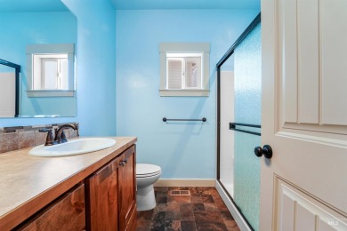 Gorgeous home located at the #12 hole of Red Hawk Golf Course on Hunters Point Golf Club in Idaho - for sale on GolfHomes.com, golf home, golf lot