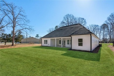 Nestled in the prestigious gated community of The Orchard in on The Orchard Golf and Country Club in Georgia - for sale on GolfHomes.com, golf home, golf lot