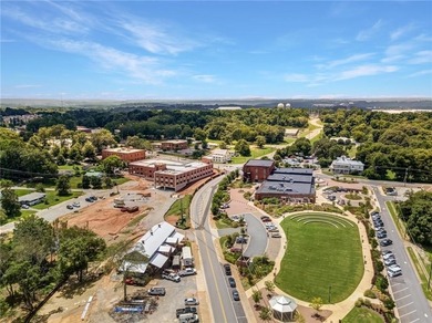 Nestled in the prestigious gated community of The Orchard in on The Orchard Golf and Country Club in Georgia - for sale on GolfHomes.com, golf home, golf lot