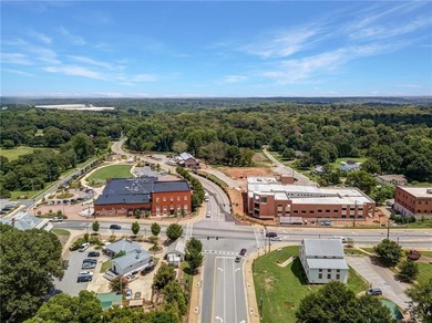 Nestled in the prestigious gated community of The Orchard in on The Orchard Golf and Country Club in Georgia - for sale on GolfHomes.com, golf home, golf lot