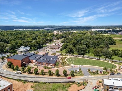 Nestled in the prestigious gated community of The Orchard in on The Orchard Golf and Country Club in Georgia - for sale on GolfHomes.com, golf home, golf lot