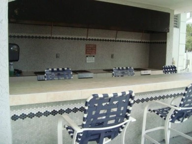 Welcome to this attractive remodeled condo with 2 split bedrooms on Feather Sound Country Club in Florida - for sale on GolfHomes.com, golf home, golf lot