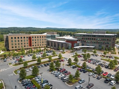 Nestled in the prestigious gated community of The Orchard in on The Orchard Golf and Country Club in Georgia - for sale on GolfHomes.com, golf home, golf lot