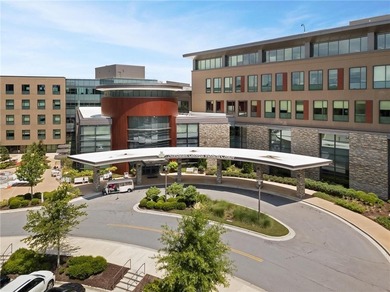 Nestled in the prestigious gated community of The Orchard in on The Orchard Golf and Country Club in Georgia - for sale on GolfHomes.com, golf home, golf lot