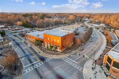 Nestled in the prestigious gated community of The Orchard in on The Orchard Golf and Country Club in Georgia - for sale on GolfHomes.com, golf home, golf lot
