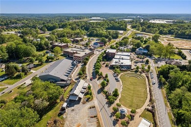 Nestled in the prestigious gated community of The Orchard in on The Orchard Golf and Country Club in Georgia - for sale on GolfHomes.com, golf home, golf lot