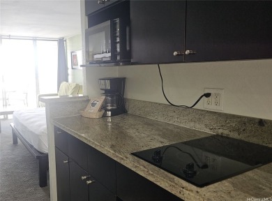 Discover this high-floor studio condo at the Island Colony! Not on Ala Wai Golf Course in Hawaii - for sale on GolfHomes.com, golf home, golf lot