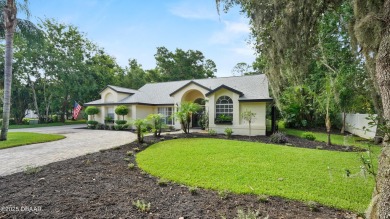 Stunning 3 bed, 2 bath home in the desirable Sugar Mill Country on Sugar Mill Country Club in Florida - for sale on GolfHomes.com, golf home, golf lot