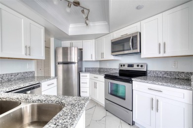 Embrace the best Florida lifestyle in this beautifully updated on Oceans Golf Club in Florida - for sale on GolfHomes.com, golf home, golf lot