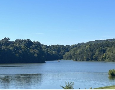 Welcome to 7 Creekwood -- the perfect home away from home. This on  in Illinois - for sale on GolfHomes.com, golf home, golf lot