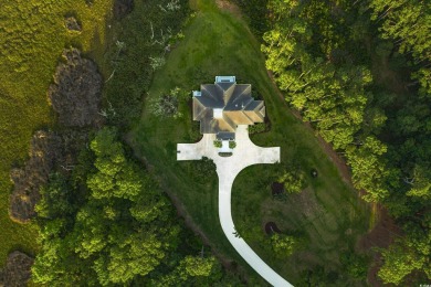 Escape to a truly exceptional Lowcountry retreat where privacy on Pawleys Plantation Golf and Country Club in South Carolina - for sale on GolfHomes.com, golf home, golf lot
