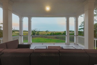 Escape to a truly exceptional Lowcountry retreat where privacy on Pawleys Plantation Golf and Country Club in South Carolina - for sale on GolfHomes.com, golf home, golf lot