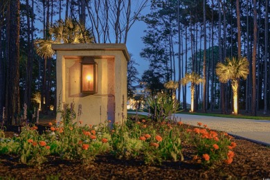 Escape to a truly exceptional Lowcountry retreat where privacy on Pawleys Plantation Golf and Country Club in South Carolina - for sale on GolfHomes.com, golf home, golf lot
