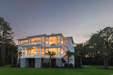 Escape to a truly exceptional Lowcountry retreat where privacy on Pawleys Plantation Golf and Country Club in South Carolina - for sale on GolfHomes.com, golf home, golf lot