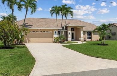 Welcome to your luxury waterfront oasis in Southwest Cape Coral on Royal Tee Country Club in Florida - for sale on GolfHomes.com, golf home, golf lot