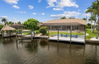Welcome to your luxury waterfront oasis in Southwest Cape Coral on Royal Tee Country Club in Florida - for sale on GolfHomes.com, golf home, golf lot