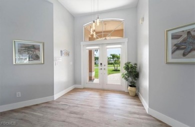 Welcome to your luxury waterfront oasis in Southwest Cape Coral on Royal Tee Country Club in Florida - for sale on GolfHomes.com, golf home, golf lot