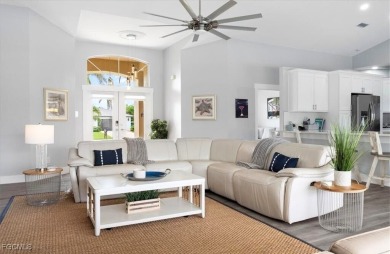 Welcome to your luxury waterfront oasis in Southwest Cape Coral on Royal Tee Country Club in Florida - for sale on GolfHomes.com, golf home, golf lot
