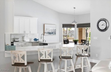 Welcome to your luxury waterfront oasis in Southwest Cape Coral on Royal Tee Country Club in Florida - for sale on GolfHomes.com, golf home, golf lot