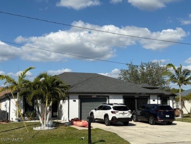 BEAUTIFUL, NEWER DUPLEX (BUILT IN 2018) located IN THE HEART OF on Cape Coral Executive Course in Florida - for sale on GolfHomes.com, golf home, golf lot