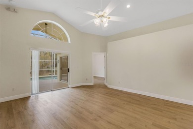 This beautiful POOL home is located in a gated, golf course on Ridgewood Lakes Golf and Country Club in Florida - for sale on GolfHomes.com, golf home, golf lot