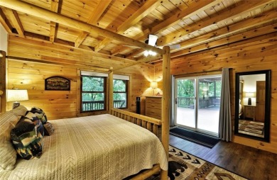 Welcome to this rare 4 bedroom, 3 1/2 bath LOG CABIN find in an on Bent Tree Golf Course in Georgia - for sale on GolfHomes.com, golf home, golf lot